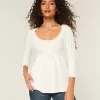 Suéter babydoll de punto trenzado
