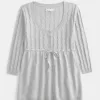 Suéter babydoll de punto trenzado