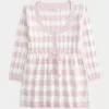 Suéter babydoll de punto trenzado