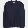 Suéter de cuello redondo de gran tamaño Suéter de cuello redondo de gran tamaño
