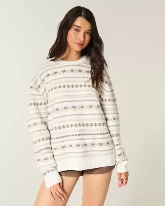 Suéter extragrande con estampado de corazones Suéter extragrande con estampado de corazones