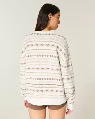 Suéter extragrande con estampado de corazones Suéter extragrande con estampado de corazones