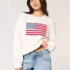 Suéter Hollister Comfy Cloud con estampado de bandera estadounidense Suéter Hollister Comfy Cloud con estampado de bandera estadounidense