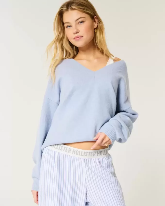 Suéter Hollister Comfy Cloud Oversize con cuello en V Suéter Hollister Comfy Cloud Oversize con cuello en V