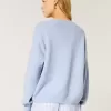 Suéter Hollister Comfy Cloud Oversize con cuello en V Suéter Hollister Comfy Cloud Oversize con cuello en V