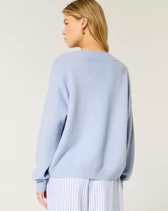 Suéter Hollister Comfy Cloud Oversize con cuello en V Suéter Hollister Comfy Cloud Oversize con cuello en V