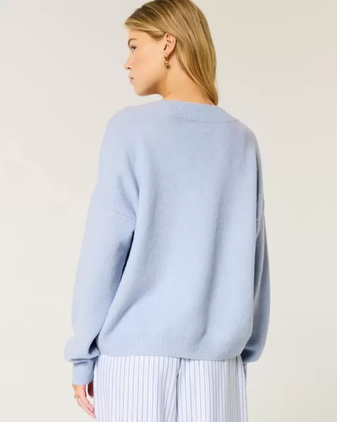 Suéter Hollister Comfy Cloud Oversize con cuello en V Suéter Hollister Comfy Cloud Oversize con cuello en V