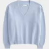 Suéter Hollister Comfy Cloud Oversize con cuello en V Suéter Hollister Comfy Cloud Oversize con cuello en V