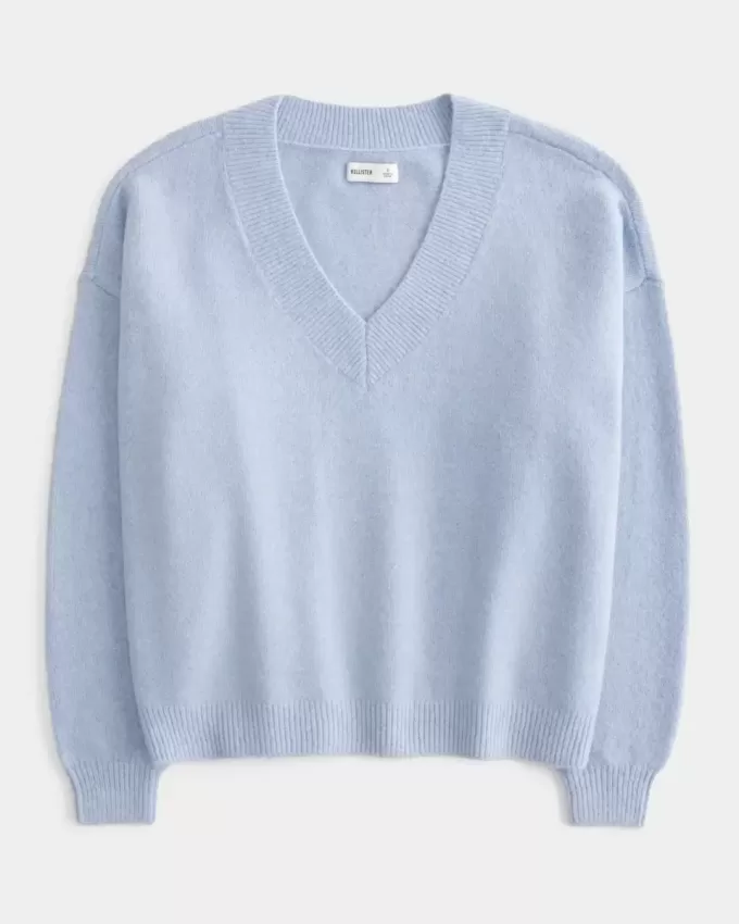 Suéter Hollister Comfy Cloud Oversize con cuello en V Suéter Hollister Comfy Cloud Oversize con cuello en V