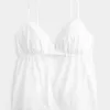 Top babydoll con bordado brillante Top babydoll con bordado brillante