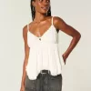 Top babydoll con tachuelas fácil de llevar Top babydoll con tachuelas fácil de llevar