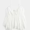Top babydoll con tachuelas fácil de llevar Top babydoll con tachuelas fácil de llevar