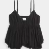 Top babydoll con tachuelas fácil de llevar Top babydoll con tachuelas fácil de llevar
