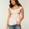 Top babydoll de satén con lazo fácil