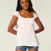 Top babydoll de satén con lazo fácil