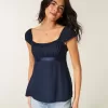 Top babydoll de satén con lazo fácil