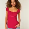 Top babydoll de satén con lazo fácil