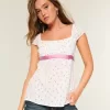 Top babydoll de satén con lazo fácil