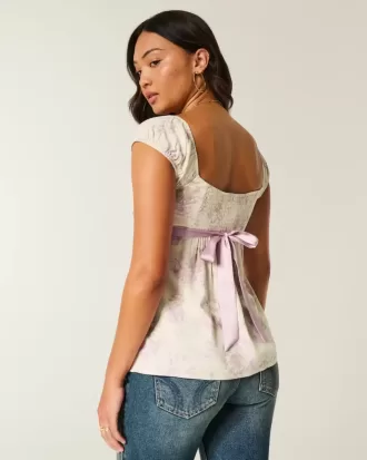 Top babydoll de satén con lazo fácil