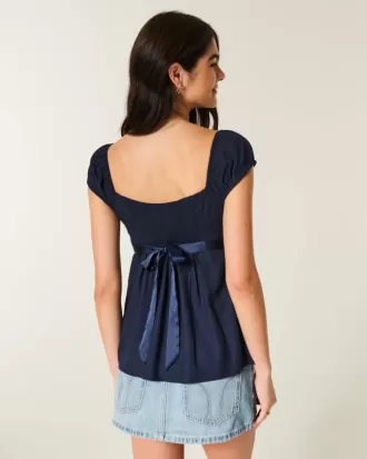 Top babydoll de satén con lazo fácil