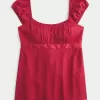Top babydoll de satén con lazo fácil
