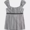 Top babydoll de satén con lazo fácil