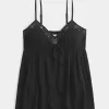 Top babydoll fruncido con brillo arrugado Top babydoll fruncido con brillo arrugado