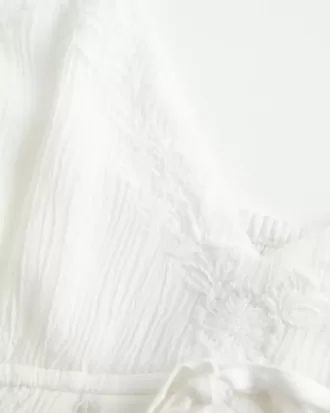 Top babydoll fruncido con brillo arrugado