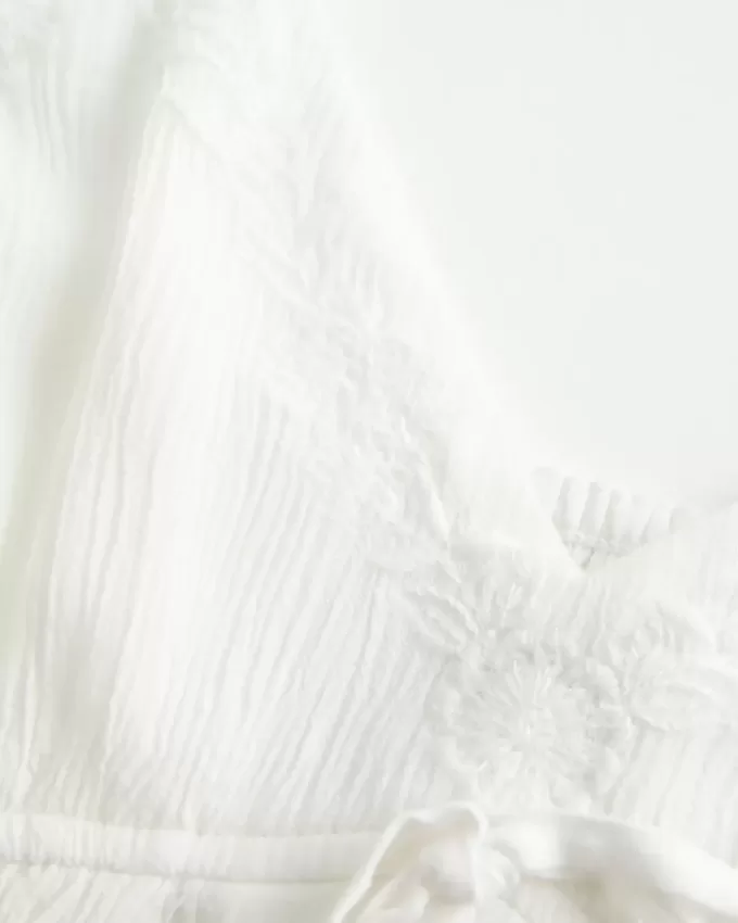 Top babydoll fruncido con brillo arrugado Top babydoll fruncido con brillo arrugado