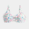 Top de bikini con aros y escote pronunciado con curvas Top de bikini con aros y escote pronunciado con curvas