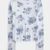 Top de manga larga con cuello oblicuo