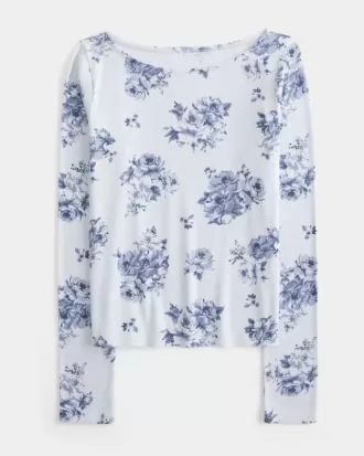 Top de manga larga con cuello oblicuo