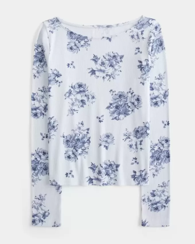 Top de manga larga con cuello oblicuo