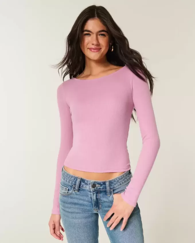Top de manga larga con cuello oblicuo