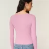 Top de manga larga con cuello oblicuo