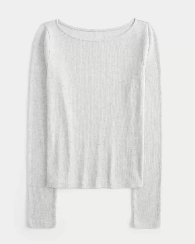 Top de manga larga con cuello oblicuo