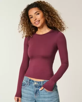 Top de manga larga con cuello redondo y tejido sin costuras Top de manga larga con cuello redondo y tejido sin costuras