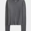 Top de manga larga con cuello redondo y tejido sin costuras Top de manga larga con cuello redondo y tejido sin costuras