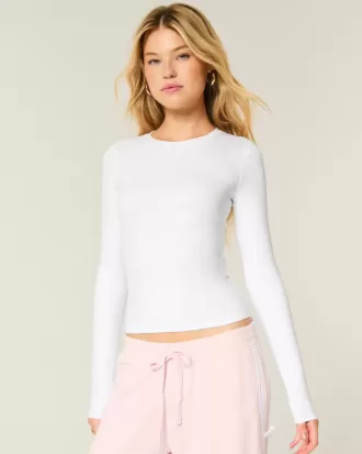Top de manga larga con cuello redondo y tejido sin costuras Top de manga larga con cuello redondo y tejido sin costuras