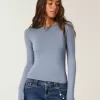 Top de manga larga con cuello redondo y tejido sin costuras Top de manga larga con cuello redondo y tejido sin costuras