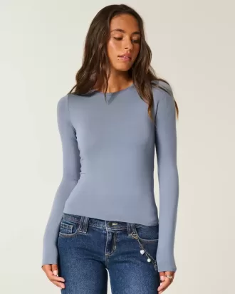 Top de manga larga con cuello redondo y tejido sin costuras Top de manga larga con cuello redondo y tejido sin costuras