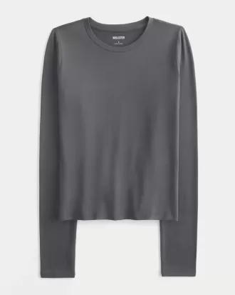 Top de manga larga con cuello redondo y tejido sin costuras Top de manga larga con cuello redondo y tejido sin costuras