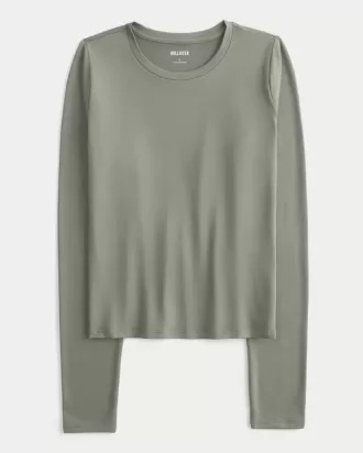 Top de manga larga con cuello redondo y tejido sin costuras Top de manga larga con cuello redondo y tejido sin costuras