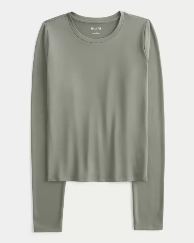Top de manga larga con cuello redondo y tejido sin costuras Top de manga larga con cuello redondo y tejido sin costuras