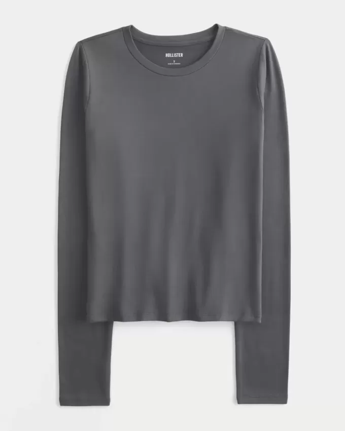 Top de manga larga con cuello redondo y tejido sin costuras Top de manga larga con cuello redondo y tejido sin costuras