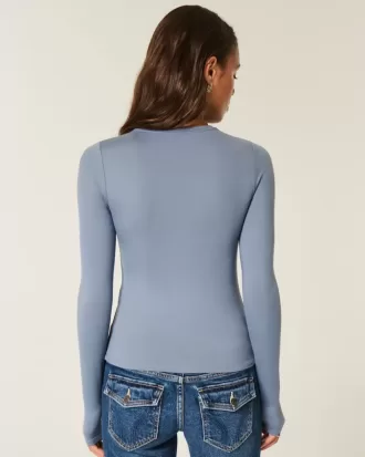 Top de manga larga con cuello redondo y tejido sin costuras Top de manga larga con cuello redondo y tejido sin costuras
