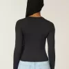 Top de manga larga con cuello redondo y tejido sin costuras Top de manga larga con cuello redondo y tejido sin costuras