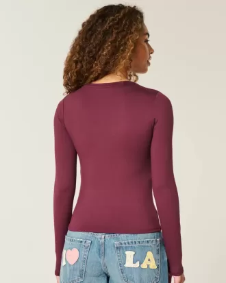Top de manga larga con cuello redondo y tejido sin costuras Top de manga larga con cuello redondo y tejido sin costuras