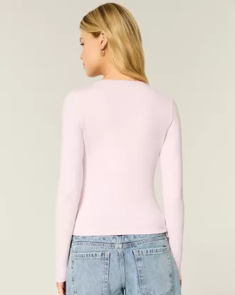 Top de manga larga con cuello redondo y tejido sin costuras
