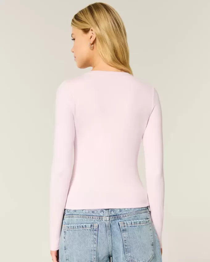 Top de manga larga con cuello redondo y tejido sin costuras Top de manga larga con cuello redondo y tejido sin costuras